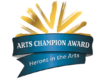 Blue ribbon badge reading 'Arts Champion Award' with gold burst accents and the subtitle 'Heroes in the Arts'